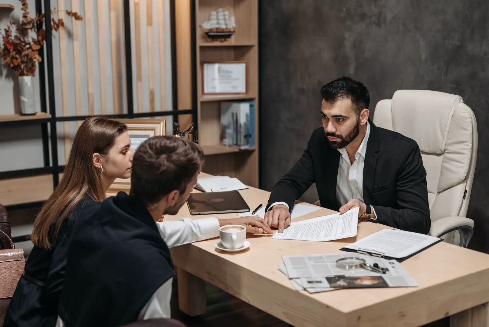 Legal professionals collaborating in a modern office