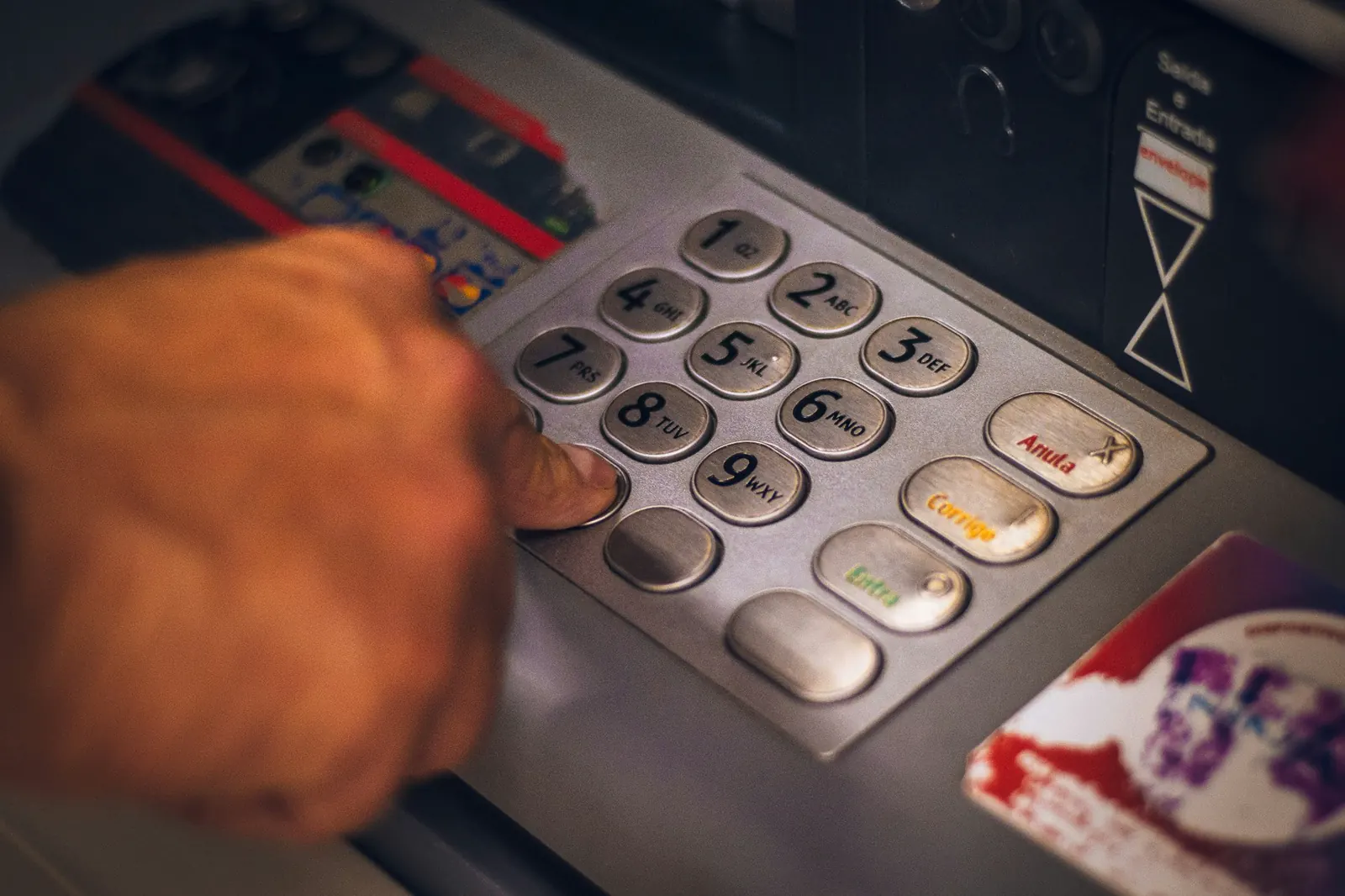Person using a bank cash machine