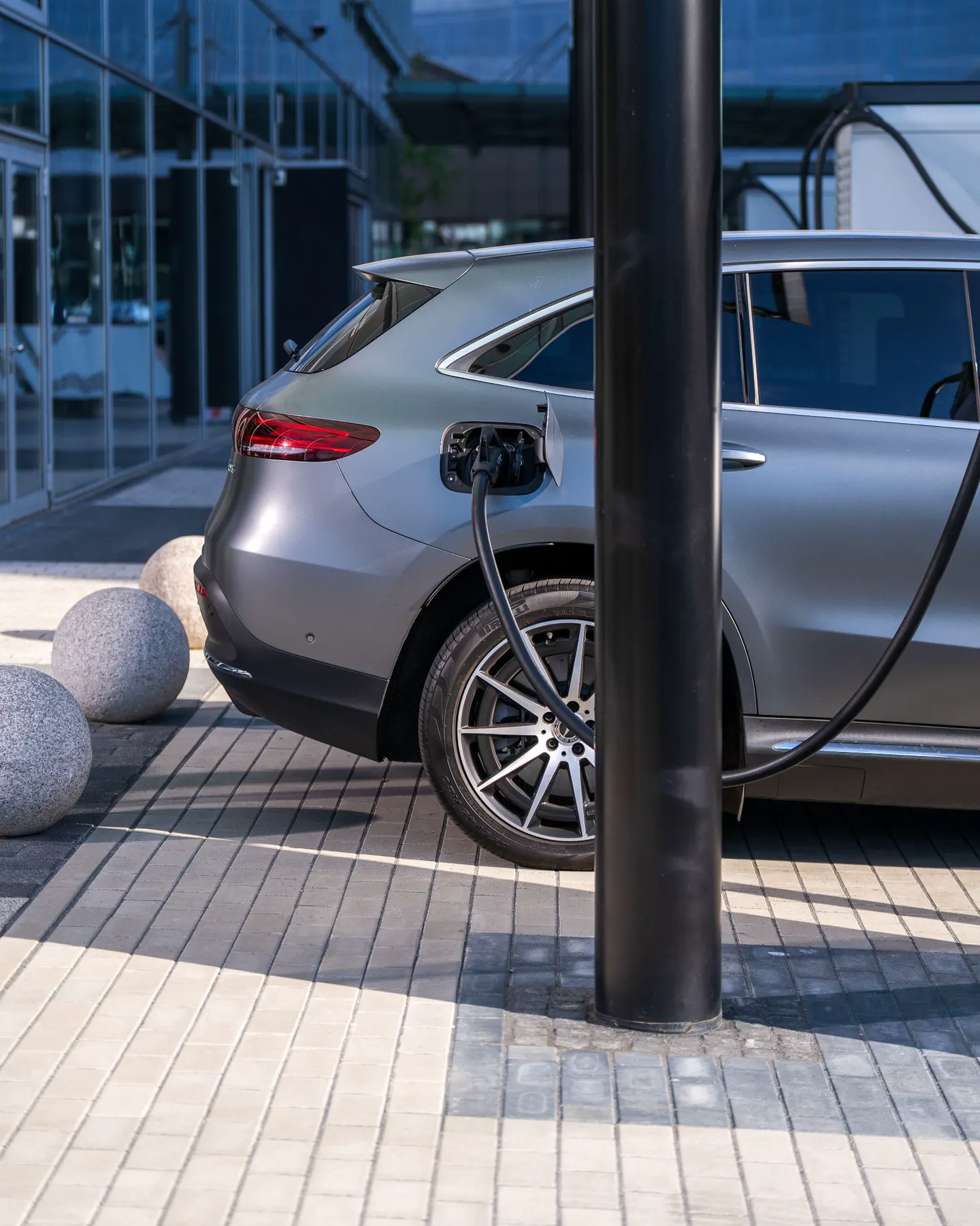 Electric vehicle connected to a charging point